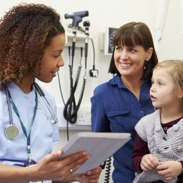 A nurse with a small girl & another patient.
