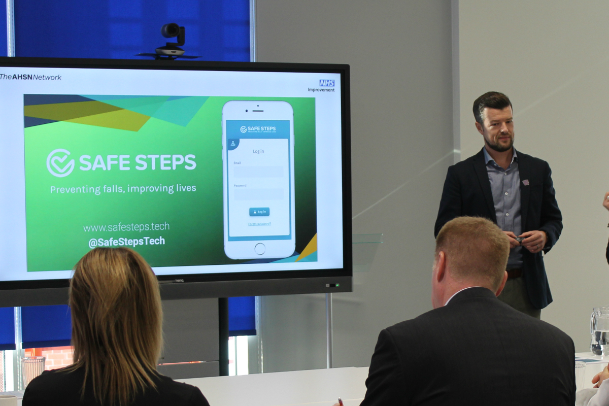 James Chapman, Safe Steps, presents to Aidan Fowler and the Patient Safety Collaborative