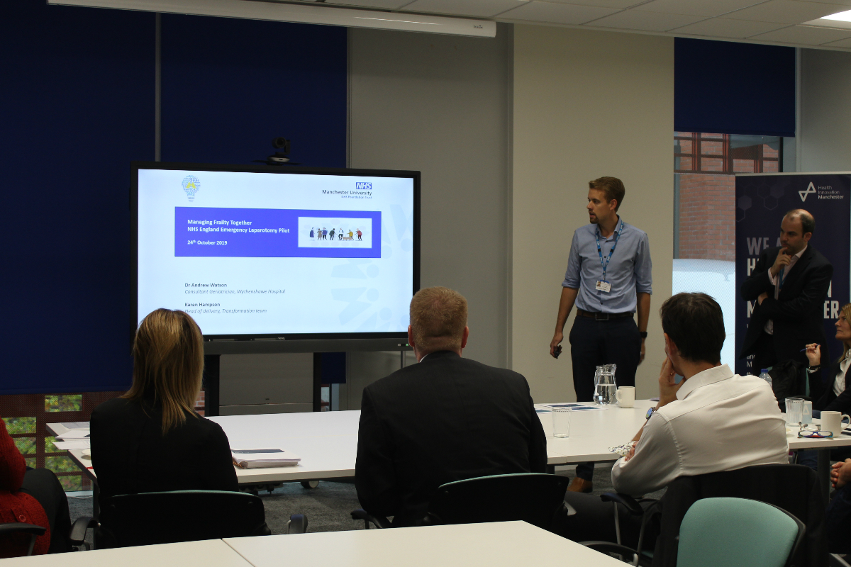 Dr Andrew Watson, Consultant Geriatrician, Wythenshawe Hospital presenting on Emergency Laparotomy to Aidan Fowler and the patient safety collaborative