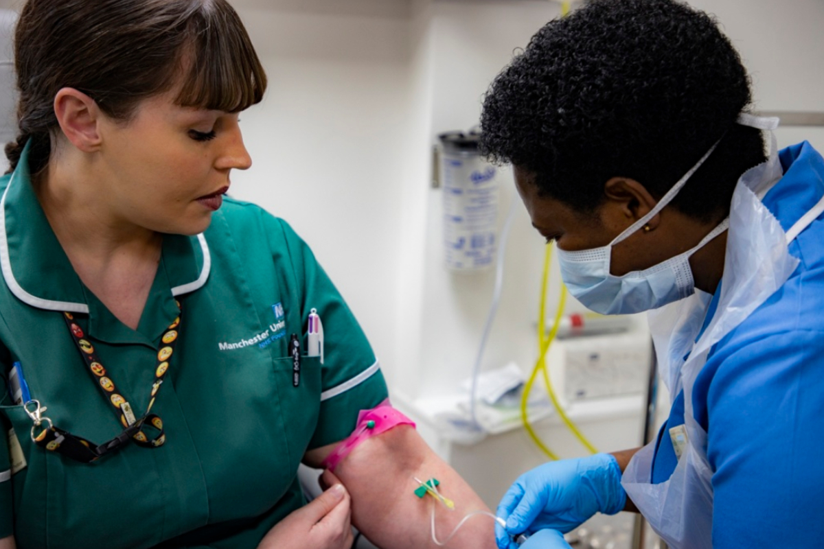 Michelle Hepburn, Clinical Research Practitioner at MFT, provides a blood sample as part of the PHE ESCAPE-COVID research study at MFT