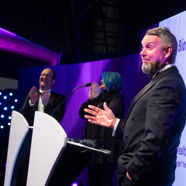 Richard Deed, Associate Commercial Director at Health Innovation Manchester, presenting the Product of the Year Award.