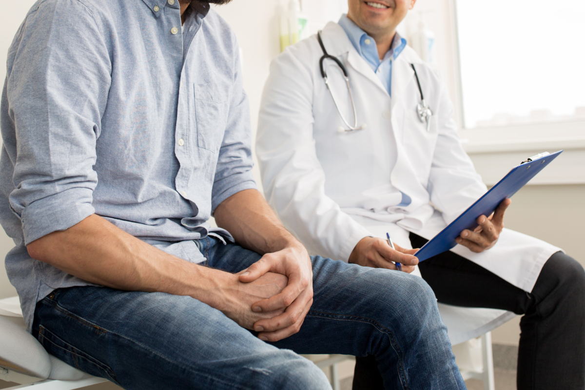 Male patient with a male doctor.