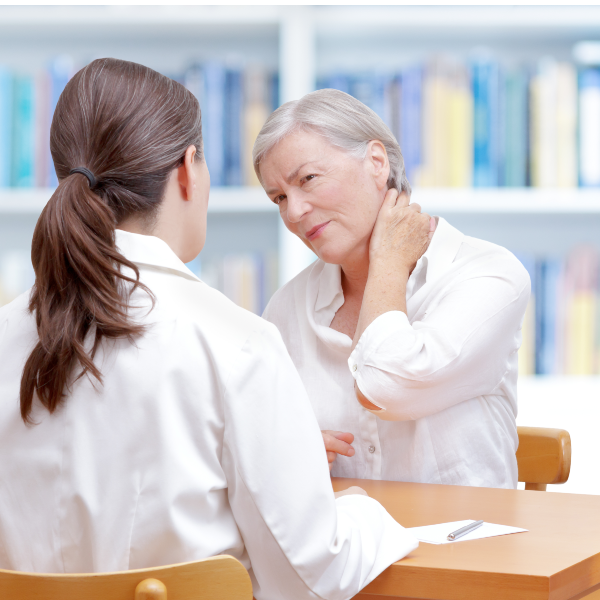 Senior female patient consulting her physician or doctor